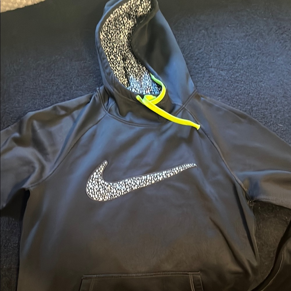Nike Black Jacket with Iconic Swoosh and Neon Accents